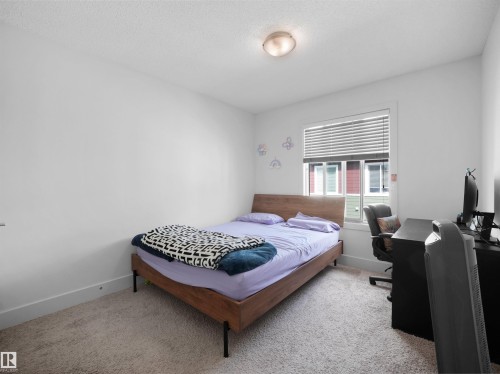 Carpet flooring, white walls, flush mount ceiling light, and a window with blinds - #40 2003 Rabbit Hill Rd Nw, Edmonton, AB 