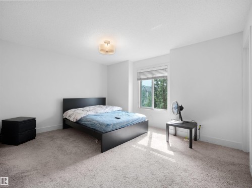 White walls with neutral carpeting - #40 2003 Rabbit Hill Rd Nw, Edmonton, AB 