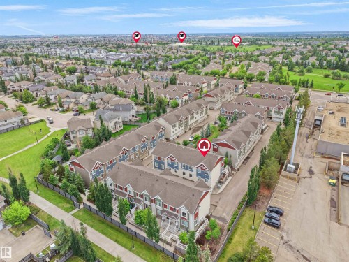 Aerial perspective showcasing a residential community with multi-level townhomes - #40 2003 Rabbit Hill Rd Nw, Edmonton, AB 