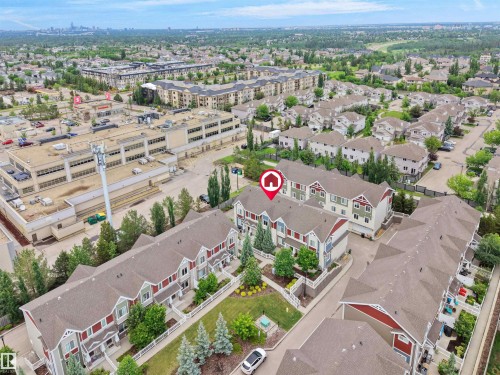 Townhouse community featuring multiple-story buildings and gabled roofs - #40 2003 Rabbit Hill Rd Nw, Edmonton, AB 