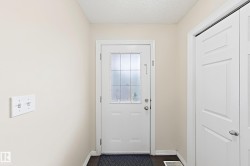 White paneled door with frosted glass insert - 