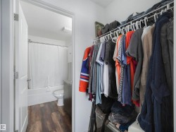 Walk-in closet with wire shelving system - 