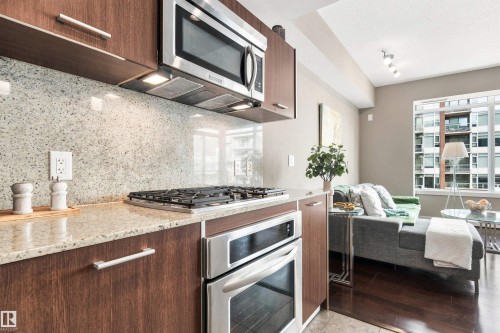 Stainless steel microwave, gas cooktop, and built-in oven - #416 2510 109 St Nw, Edmonton, AB 