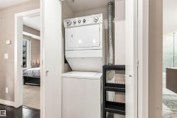 Integrated stacked washer and dryer in dedicated closet - 