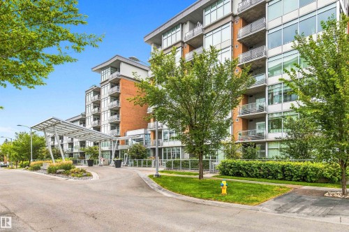 Contemporary multi-story building featuring brick and glass facade - #416 2510 109 St Nw, Edmonton, AB 