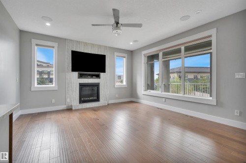 Wood-finish flooring throughout - 9054 24 Avenue Sw, Edmonton, AB 