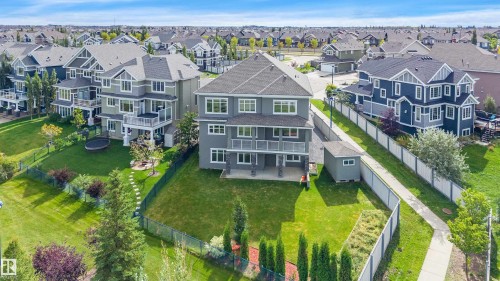 Multi-level property with balconies and an expansive green lawn - 9054 24 Avenue Sw, Edmonton, AB 