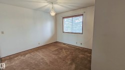 Recessed window with wood-finish trim and horizontal blinds - 
