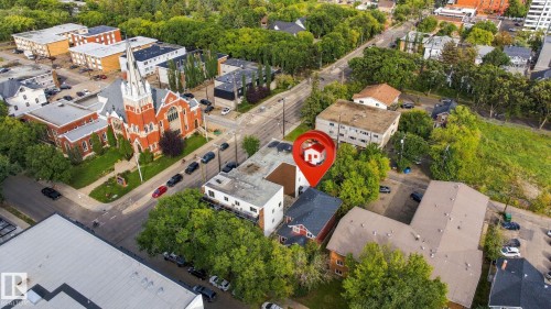 Urban setting with mature trees and established residential structures - 10143 123 Street Nw, Edmonton, AB 