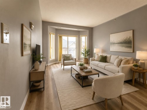 Spacious living area featuring light wood-finish flooring, a neutral color palette, a bay window with multiple panes, and a glass-paneled exterior door - #412 4304 139 Av Nw, Edmonton, AB - Indoor Photo Showing Living Room