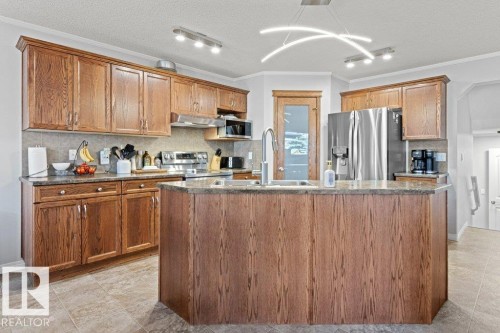 271 Westwood Point(E), Fort Saskatchewan, AB - Indoor Photo Showing Kitchen With Double Sink