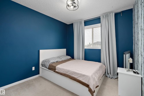 306 Simmonds Way, Leduc, AB - Indoor Photo Showing Bedroom