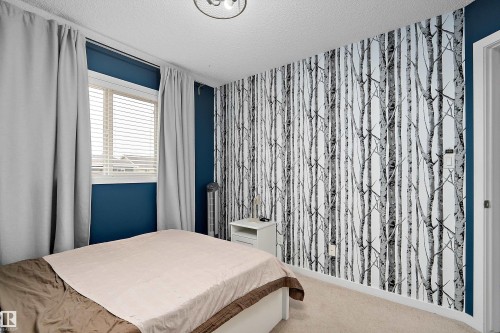 306 Simmonds Way, Leduc, AB - Indoor Photo Showing Bedroom