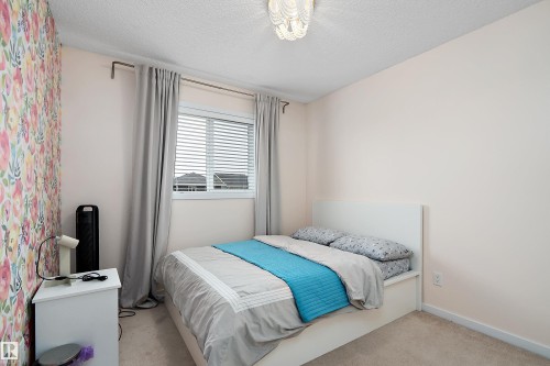 306 Simmonds Way, Leduc, AB - Indoor Photo Showing Bedroom