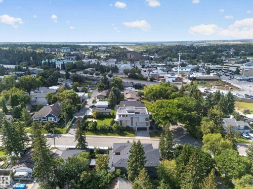 Urban landscape featuring residential properties and established trees - 14A Birch Drive, St. Albert, AB 