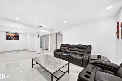 Recessed lighting, tile flooring, solid white walls, and white trim - 12035 168 Avenue Nw, Edmonton, AB 