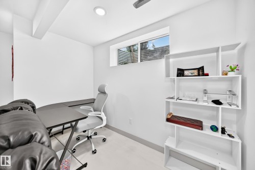 Recessed ceiling lighting, white walls, and a built-in shelving unit - 12035 168 Avenue Nw, Edmonton, AB 