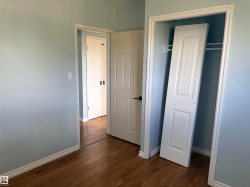 Wood-finish flooring throughout Bedroom 2 upstairs - 