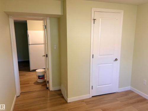 Basement kitchen  walking out of bedroom 1 . - 13219 107 Street Nw, Edmonton, AB 