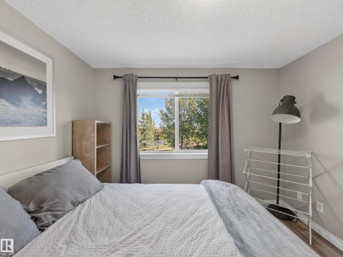#44 12050 17 Av Sw, Edmonton, AB - Indoor Photo Showing Bedroom