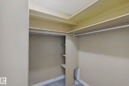 Built-in shelving, hanging rod, and recessed ceiling details - 16807 78 Street Nw, Edmonton, AB 