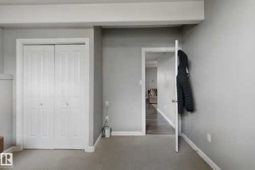 Neutral gray wall color complemented by white trim - 16807 78 Street Nw, Edmonton, AB 