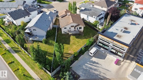 Expansive lot featuring mature trees, residential zoning, established neighborhood, and paved street access - 16807 78 Street Nw, Edmonton, AB 