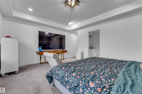 Recessed lighting, tray ceiling, and carpeted flooring - 1409 Graydon Hill Way Sw, Edmonton, AB 