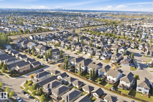 Expansive residential neighborhood with varied architectural styles under a clear sky - 1523 36 Avenue Nw, Edmonton, AB 
