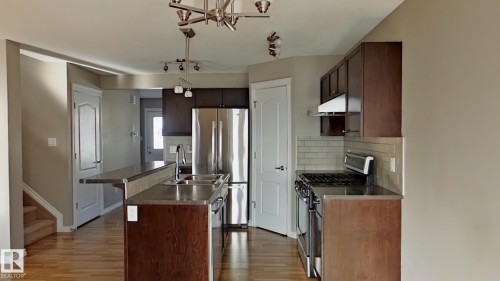 7665 Schmid Crescent Northwest, Edmonton, AB - Indoor Photo Showing Kitchen With Stainless Steel Kitchen