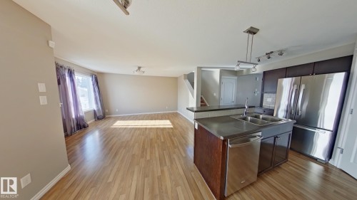 7665 Schmid Crescent Northwest, Edmonton, AB - Indoor Photo Showing Kitchen With Stainless Steel Kitchen With Double Sink