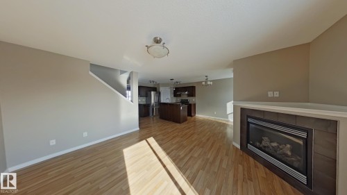 7665 Schmid Crescent Northwest, Edmonton, AB - Indoor Photo Showing Living Room With Fireplace