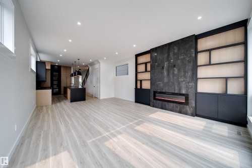 9919 87 Street Nw, Edmonton, AB - Indoor Photo Showing Other Room With Fireplace