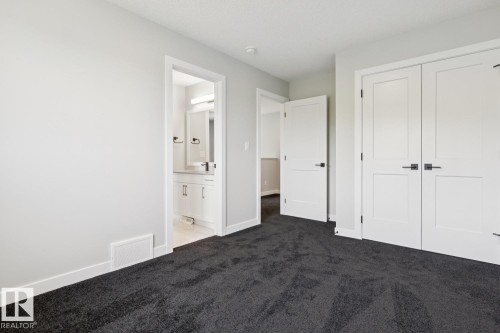 Gray carpeting with white trim - 36 Maple Crescent, Gibbons, AB 