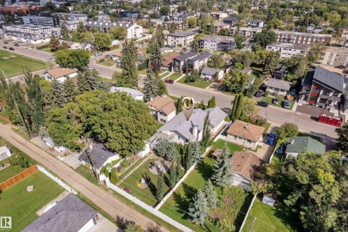 Expansive property featuring mature trees and established landscaping elements - 9722 157 Street Nw, Edmonton, AB 