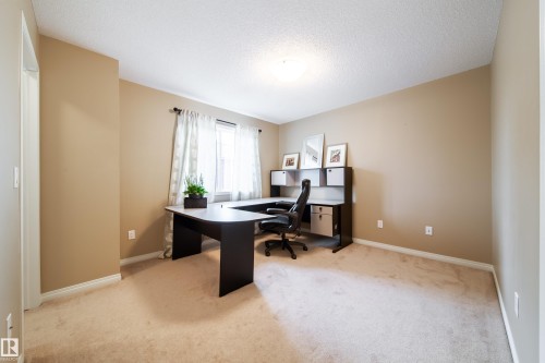 Carpeted flooring, neutral wall paint, and overhead lighting - #31 460 Hemingway Rd Nw, Edmonton, AB 