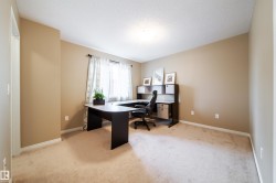 Carpeted flooring, neutral wall paint, and overhead lighting - 