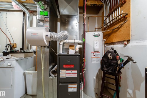 Goodman furnace, Honeywell humidifier, and a hot water heater - #31 460 Hemingway Rd Nw, Edmonton, AB 