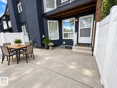 Spacious concrete patio with privacy fencing - 3526 42 Street Nw, Edmonton, AB 