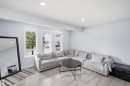 Recessed ceiling lighting, multiple windows with white trim, and wood-finish flooring - 2122 37 Avenue Nw, Edmonton, AB 