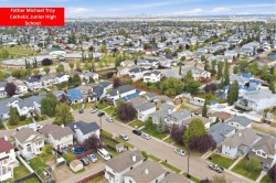 Residential neighborhood with established homes and mature trees - 