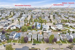 Aerial perspective showcasing a residential neighborhood with numerous single-family homes - 