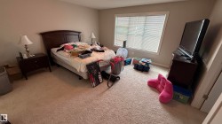 Wall-to-wall carpeting and neutral wall tones - 