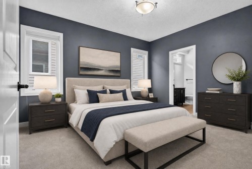 Plush carpeting, neutral wall color, and a ceiling-mounted light fixture - 904 Armitage Court Sw, Edmonton, AB 