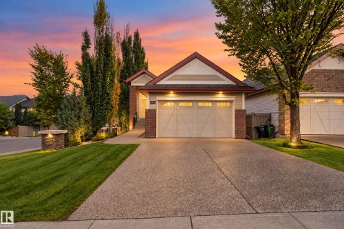 Brick and siding exterior with a pitched roof - 904 Armitage Court Sw, Edmonton, AB 
