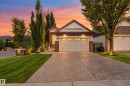 Brick and siding exterior with a pitched roof - 904 Armitage Court Sw, Edmonton, AB 