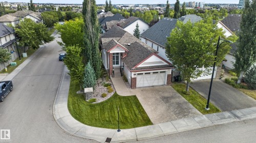 Brick and siding exterior with an attached two-car garage - 904 Armitage Court Sw, Edmonton, AB 