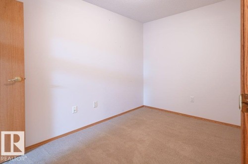 Den without virtual staging. - #203 8912 156 St Nw, Edmonton, AB 