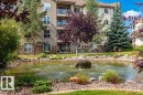 The Renaissance at Meadowlark features beautiful grounds with paved walkways, ponds & waterfalls. - #203 8912 156 St Nw, Edmonton, AB 