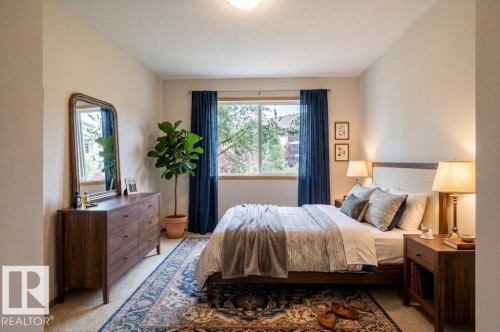 This is the 2nd bedroom in the condo.  This bedroom has been Virtually Staged. - #203 8912 156 St Nw, Edmonton, AB 